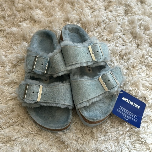 Birkenstock Shoes - New Birkenstock baby blue shearling size 37